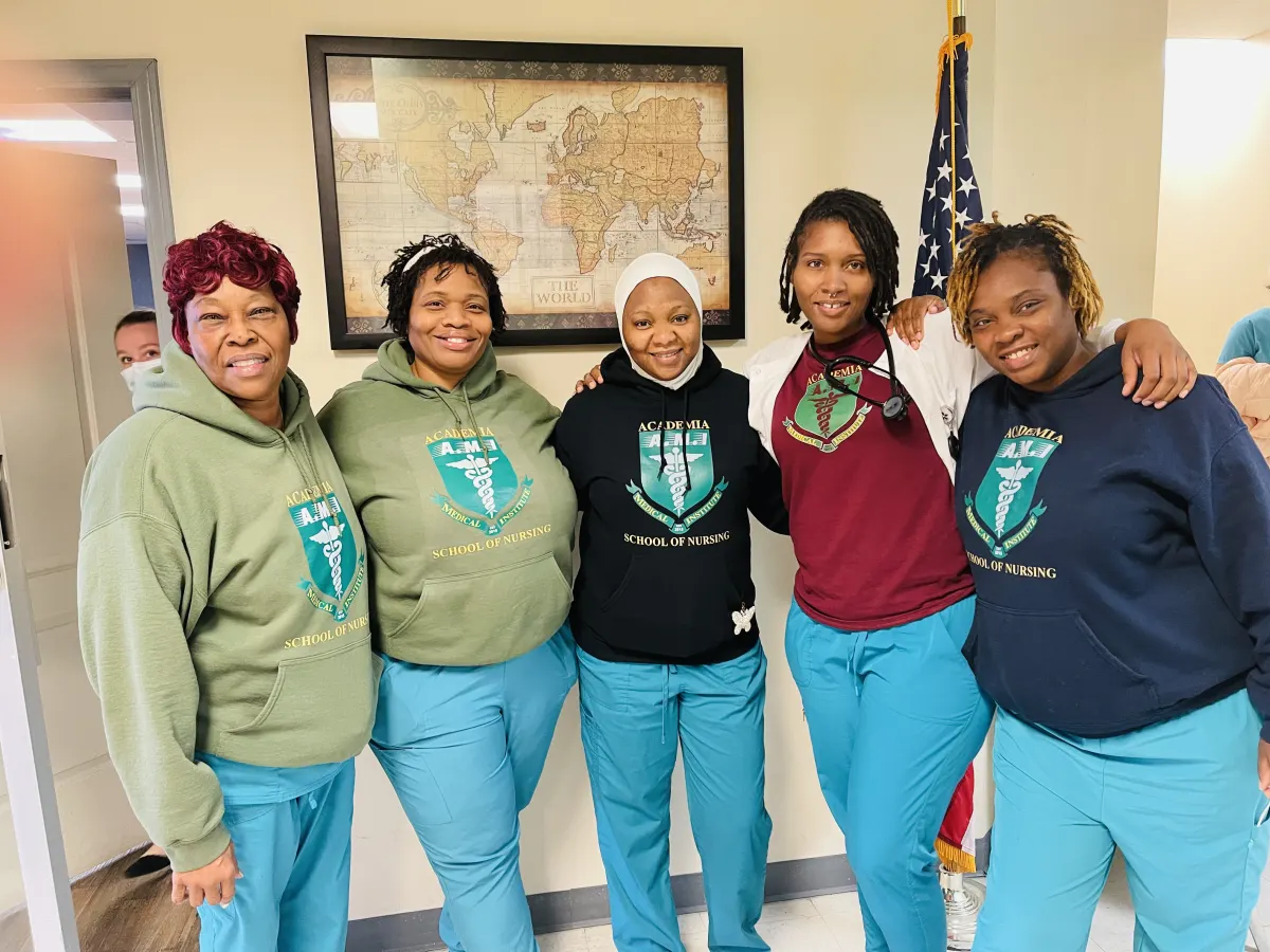 Nursing instructor teaching students at AMI